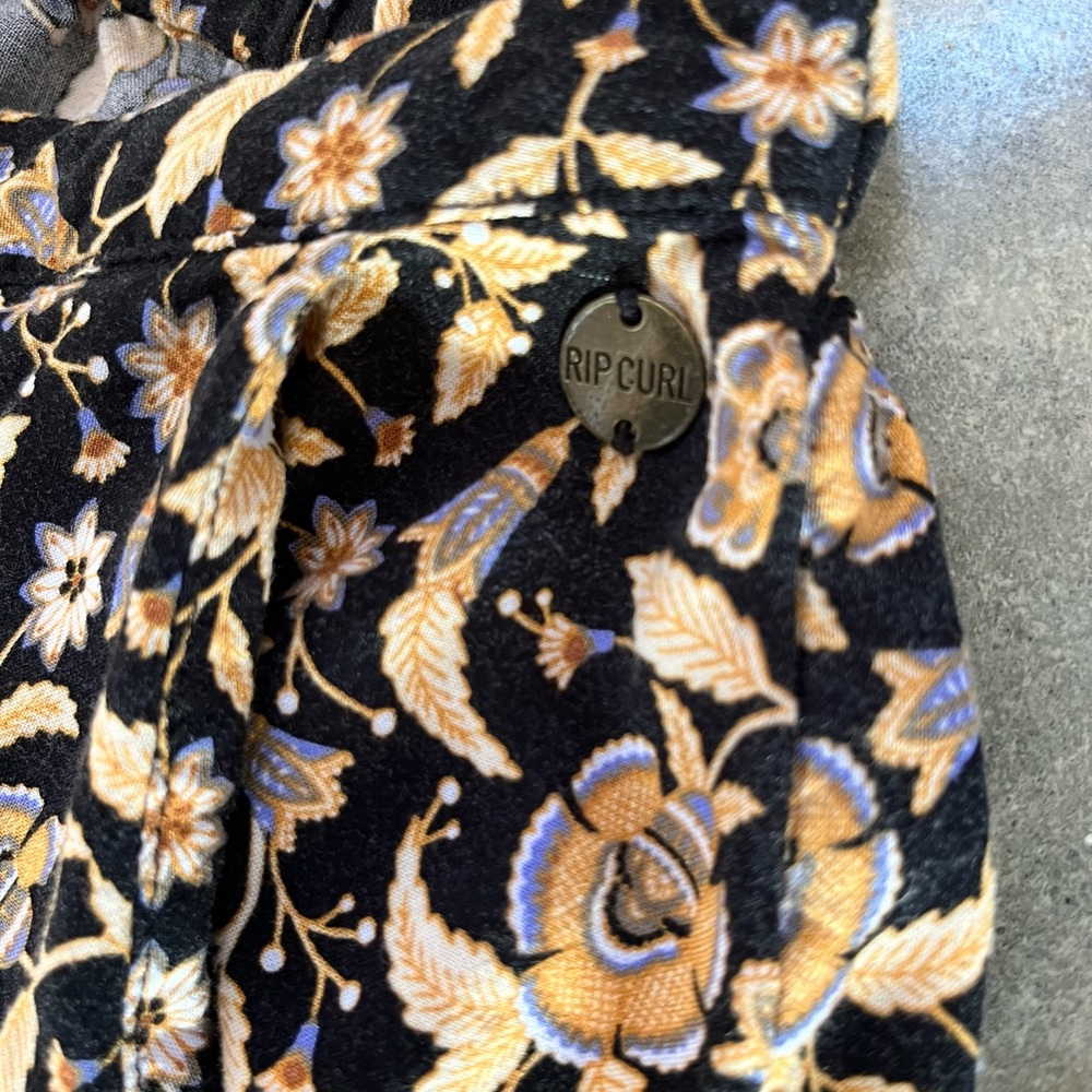 Rip Curl Black and Gold Floral wide leg pant